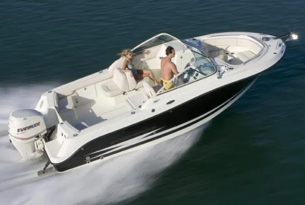 Slide: The Image of 2008 Hydra-Sports Vector 2200 DC boat cruising on water with two passengers. - 49