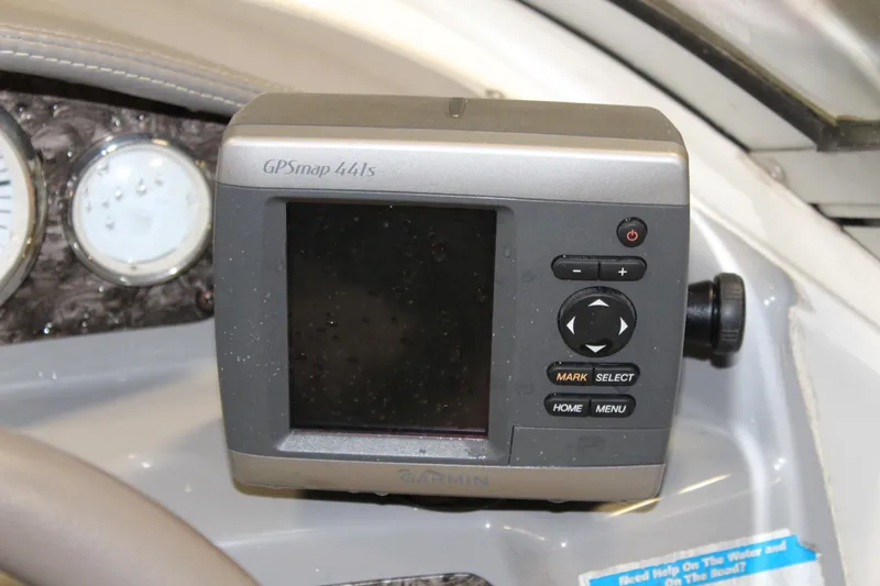 Slide: The Image of Garmin GPSmap 441s on 2013 Stingray 208 CK boat dashboard. - 23