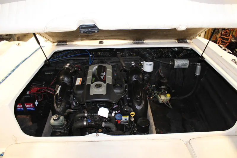 Slide: The Image of Engine compartment of a 2013 Stingray 208 CK boat. - 35