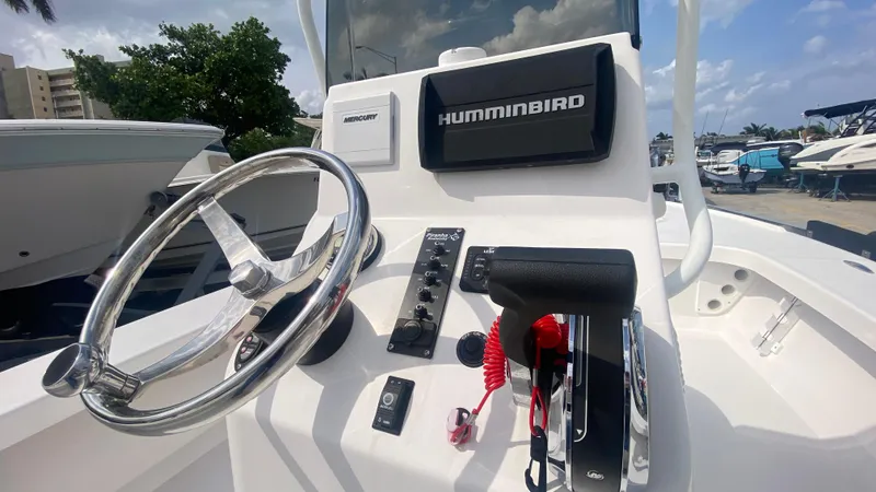 Slide: The Image of Steering console of 2025 Piranha F2000 boat with Humminbird navigation system. - 11