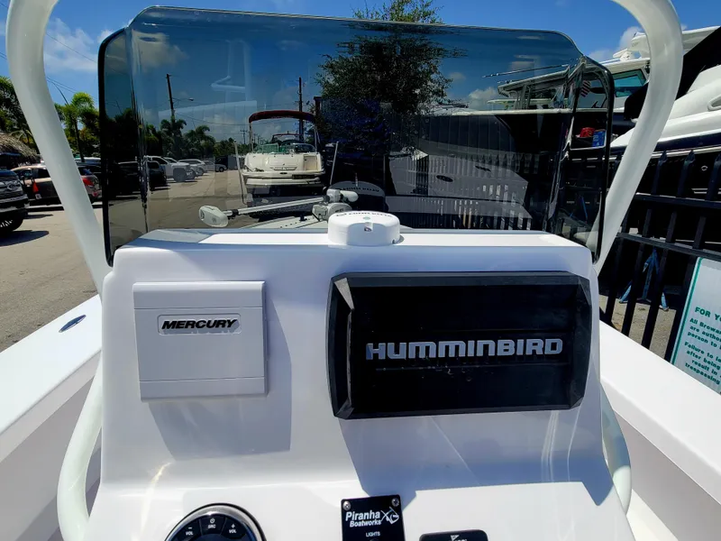 Slide: The Image of Control panel of 2025 Piranha F2000 boat with Mercury and Humminbird displays. - 12