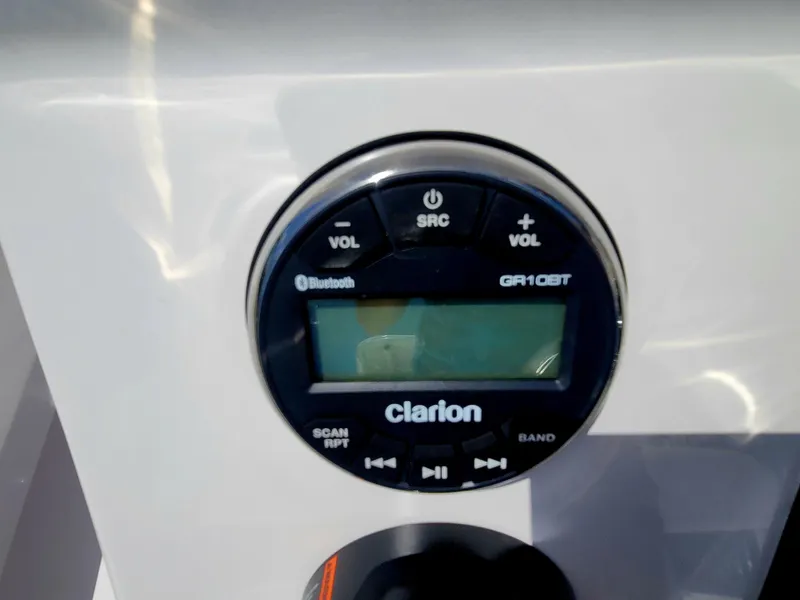 Slide: The Image of Clarion GR10BT audio system in Piranha F2000, 2025 model, featuring Bluetooth connectivity. - 25