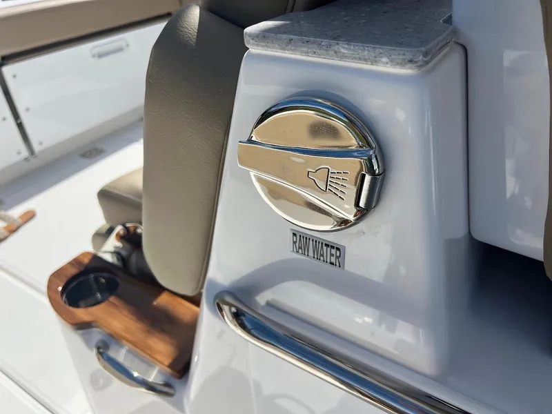Slide: The Image of 2024 Everglades 315 Center Console raw water control knob. - 28