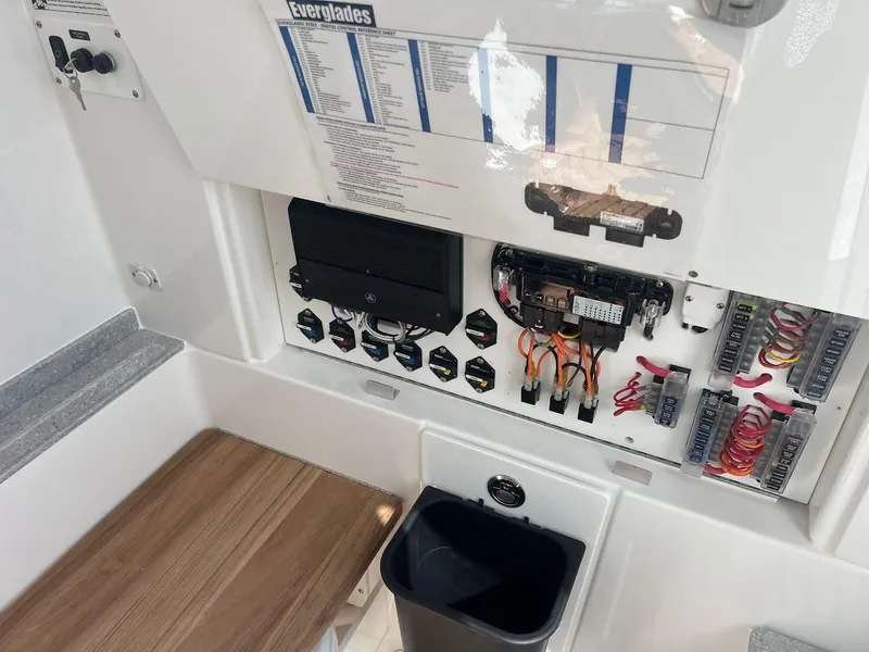 Slide: The Image of 2024 Everglades 315 Center Console electrical panel and control system. - 38