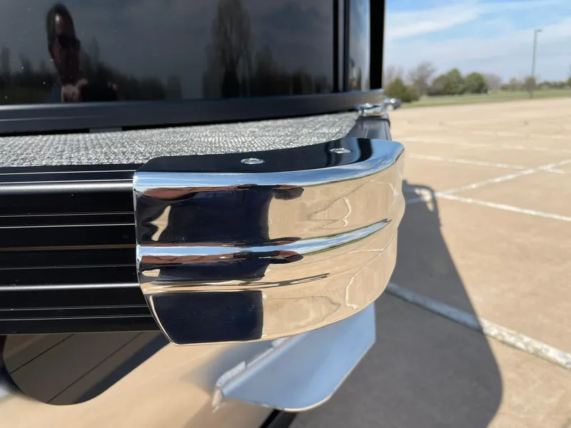 Slide: The Image of 2024 Barletta Cabrio 22UC pontoon boat with chrome trim detail. - 21
