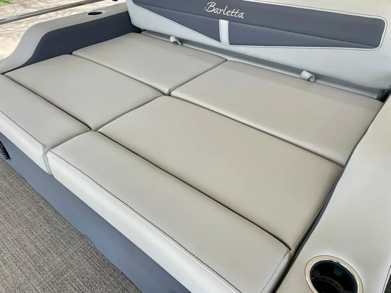 Slide: The Image of 2024 Barletta Cabrio 22UC boat interior seating with gray upholstery. - 23