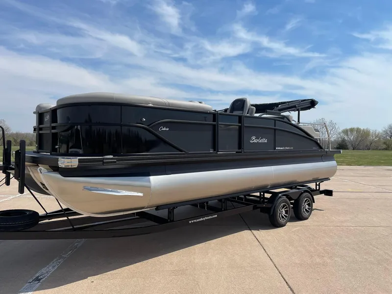 Slide: The Image of 2024 Barletta Cabrio 22UC pontoon boat on a trailer. - 3