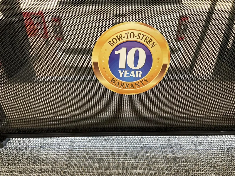 Slide: The Image of 2024 Barletta Cabrio 22UC 10-year bow-to-stern warranty badge. - 32