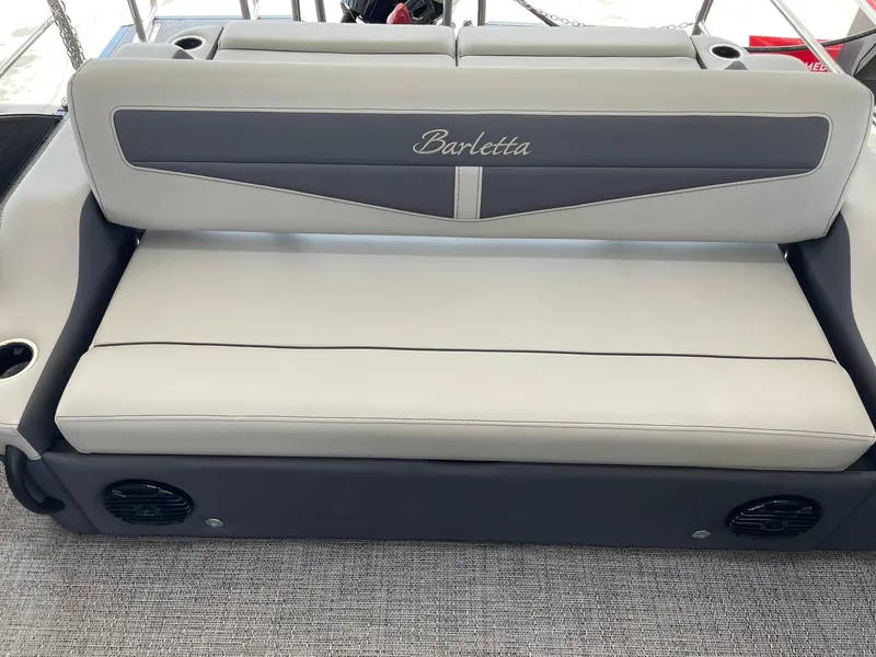 Slide: The Image of 2024 Barletta Cabrio 22UC boat seat with Barletta logo, gray and white upholstery. - 38