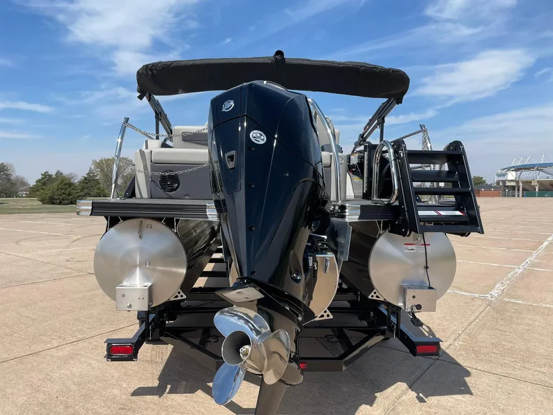 Slide: The Image of 2024 Barletta Cabrio 22UC pontoon boat rear view with outboard motor. - 8