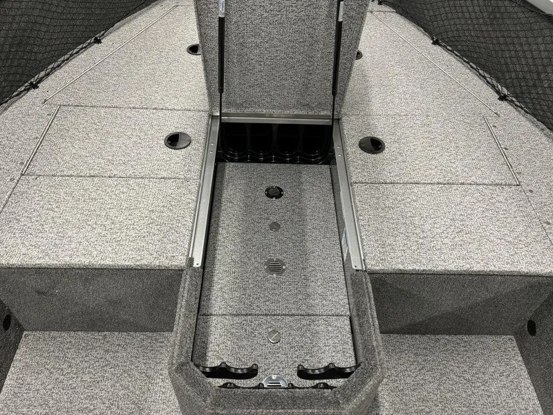 Slide: The Image of 2024 Alumacraft Voyageur 175 Tiller boat interior with storage compartments. - 8