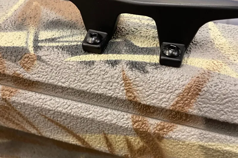 Slide: The Image of Close-up of 2024 Ranger RB210 textured surface with mounted hardware. - 11