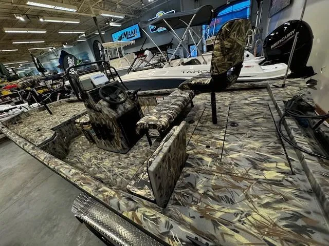 Slide: The Image of 2024 Ranger RB210 camo fishing boat on display in showroom. - 3
