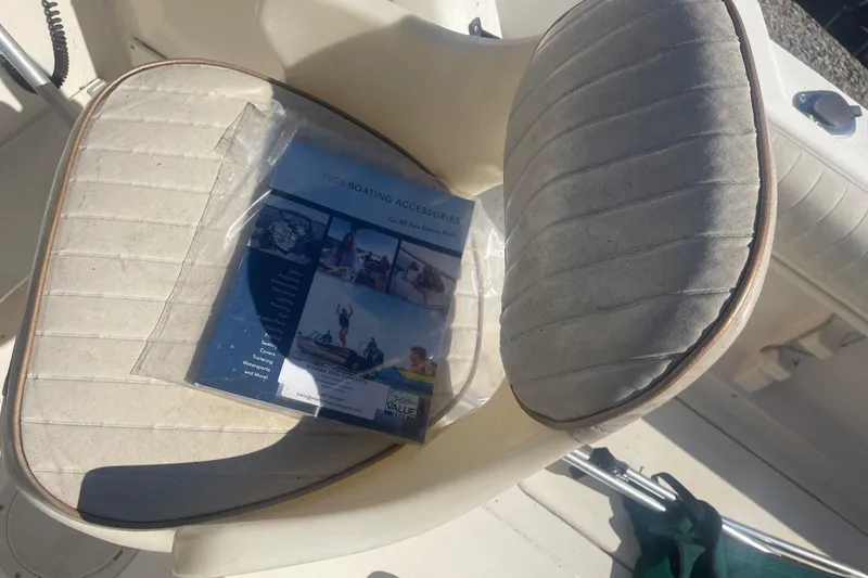 Slide: The Image of Boat seat with a 2023 boating accessories catalog on a Seamaster 2388 WA, 2000 model. - 12