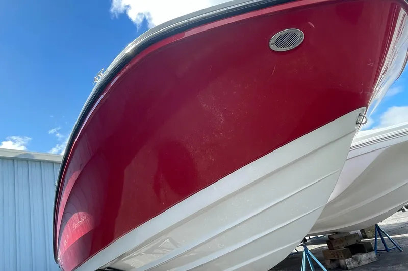 Slide: The Image of 2021 Bayliner VR5 boat with red and white hull. - 3