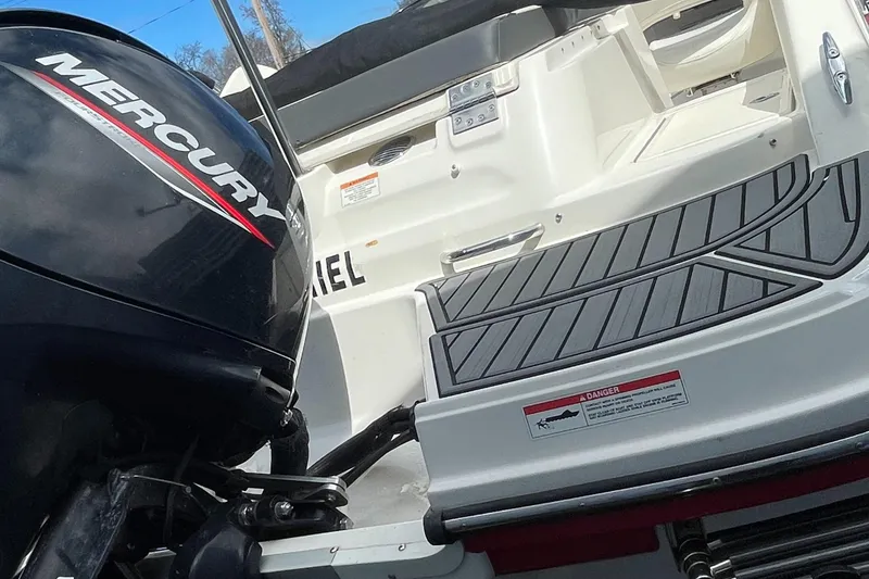 Slide: The Image of 2021 Bayliner VR5 boat with Mercury outboard motor. - 7