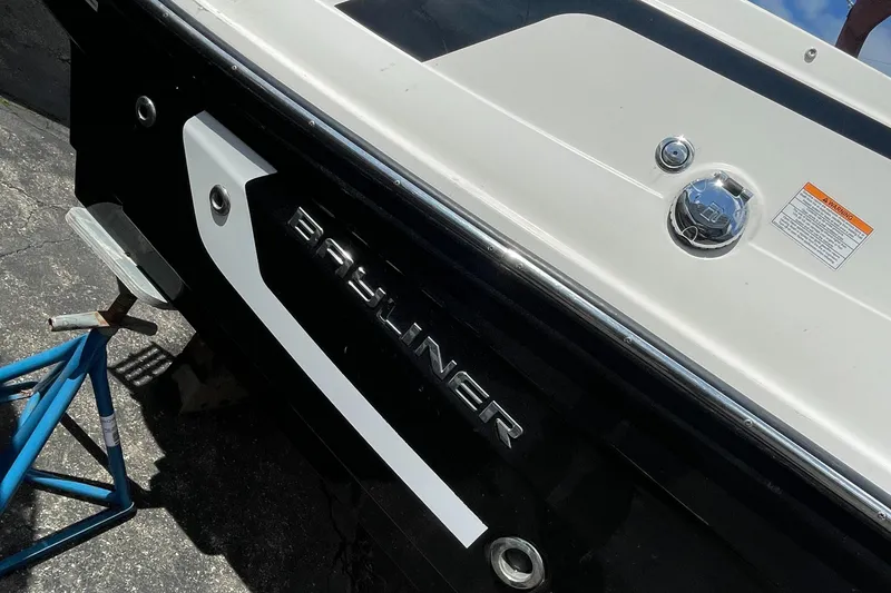 Slide: The Image of 2021 Bayliner VR5 boat rear view with logo and details. - 10