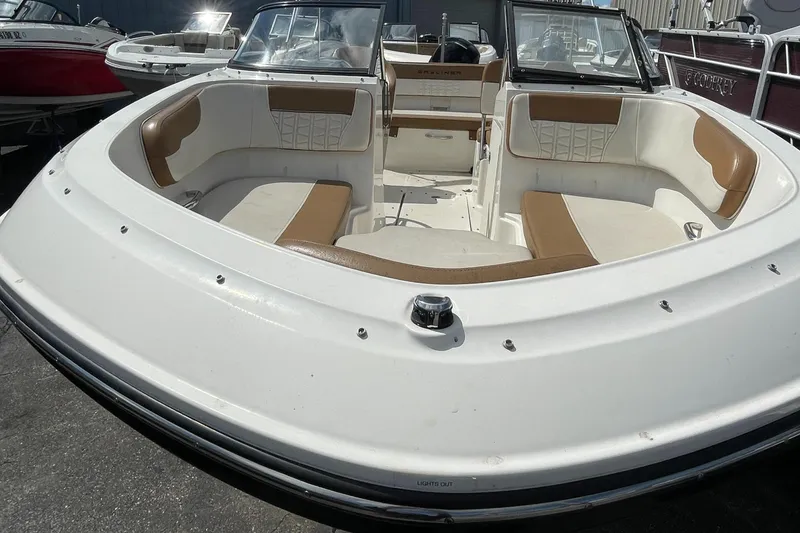 Slide: The Image of 2021 Bayliner VR5 boat with spacious seating and modern design. - 12