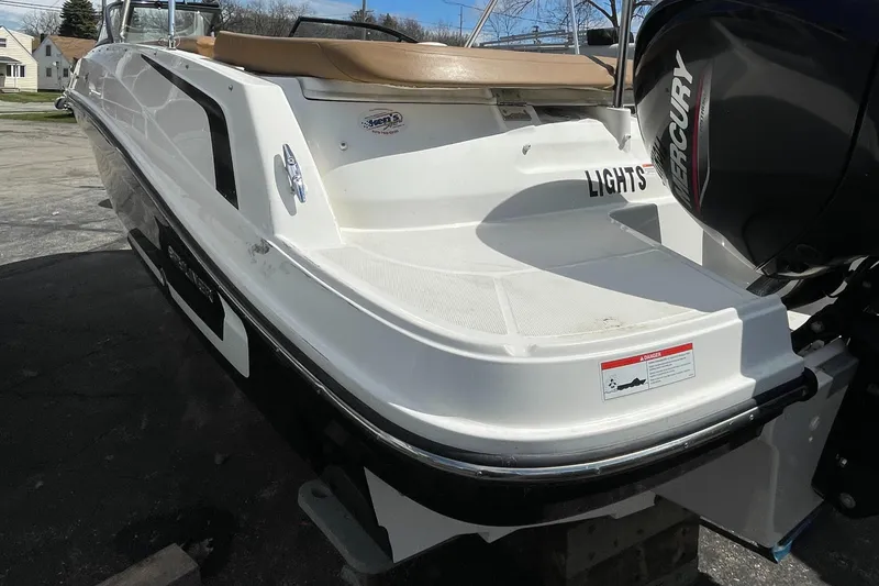 Slide: The Image of 2021 Bayliner VR5 boat with Mercury outboard motor, rear view. - 3