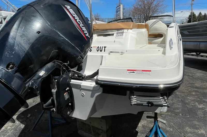 Slide: The Image of 2021 Bayliner VR5 boat with Mercury outboard motor, rear view. - 5