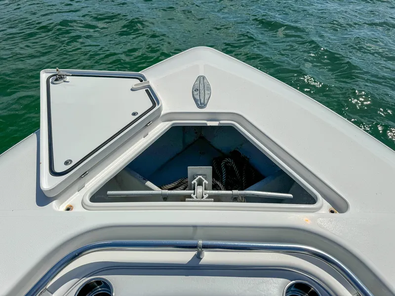 Slide: The Image of 2022 Contender 39 ST boat bow with open anchor hatch. - 17
