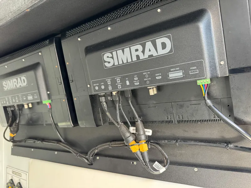 Slide: The Image of Simrad electronics on a 2022 Contender 39 ST boat. - 34