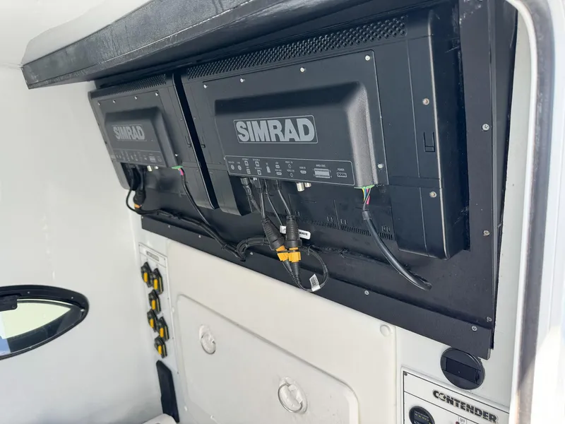Slide: The Image of 2022 Contender 39 ST boat with Simrad electronics. - 40