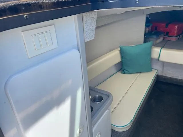 Slide: The Image of Interior cabin of a 1993 Formula 303 SR1 boat with seating and storage. - 20