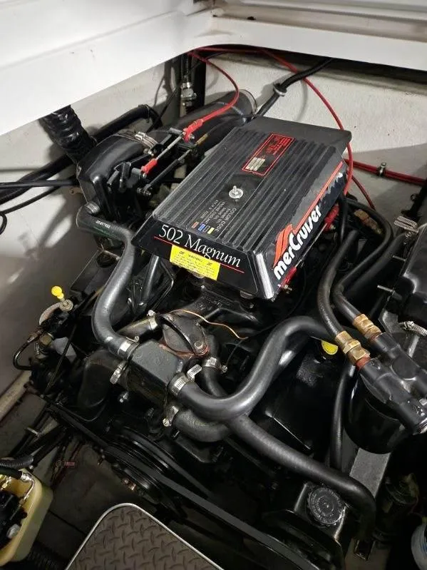 Slide: The Image of 1993 Formula 303 SR1 engine compartment with MerCruiser 502 Magnum engine. - 9