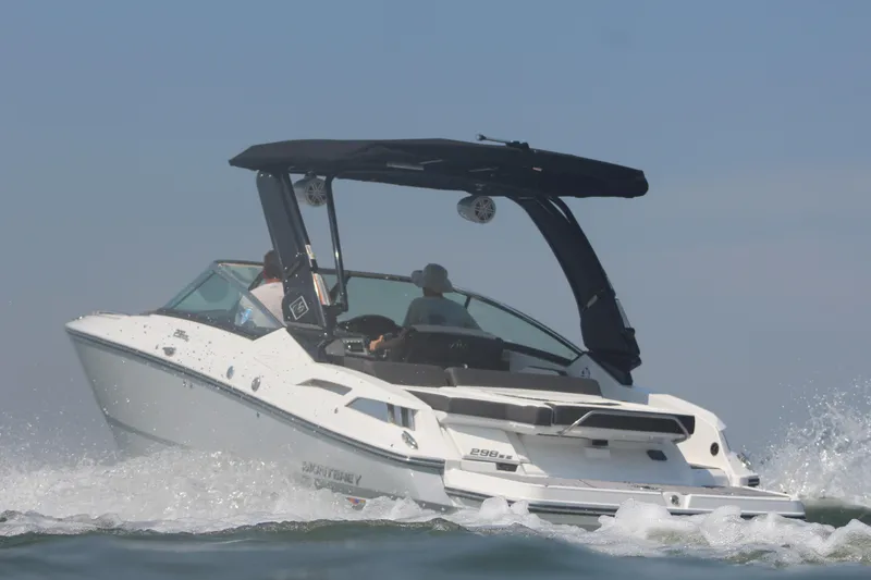 Slide: The Image of 2023 Monterey 298SS boat cruising on water. - 17