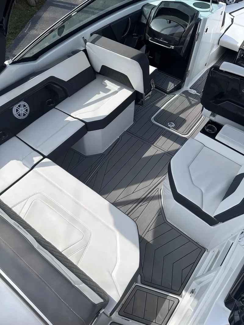 Slide: The Image of 2023 Monterey 298SS boat interior with modern seating and sleek design. - 34