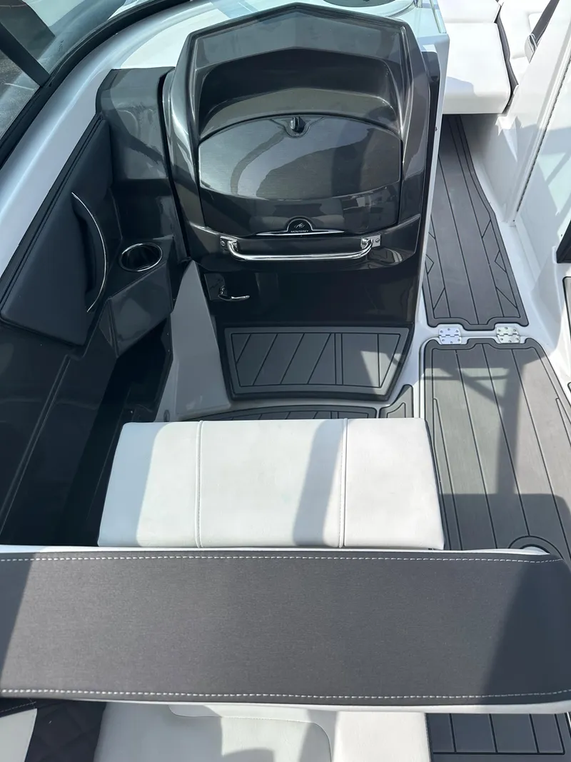 Slide: The Image of 2023 Monterey 298SS boat interior with modern seating and sleek design. - 36