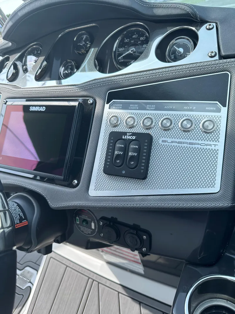 Slide: The Image of Control panel of a 2023 Monterey 298SS boat with navigation and system controls. - 40