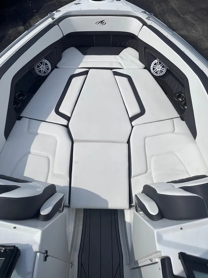 Slide: The Image of 2023 Monterey 298SS boat with luxurious white seating and modern design. - 42