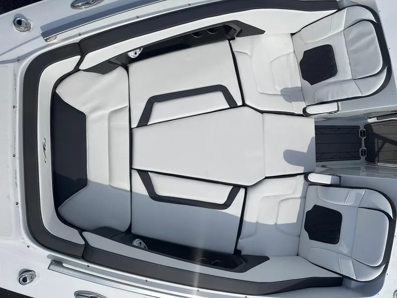 Slide: The Image of 2023 Monterey 298SS boat interior with white and black seating. - 43