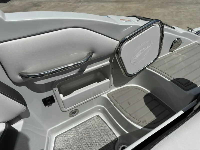 Slide: The Image of 2024 Crownline Eclipse E260 XS boat interior with spacious seating and modern design. - 16