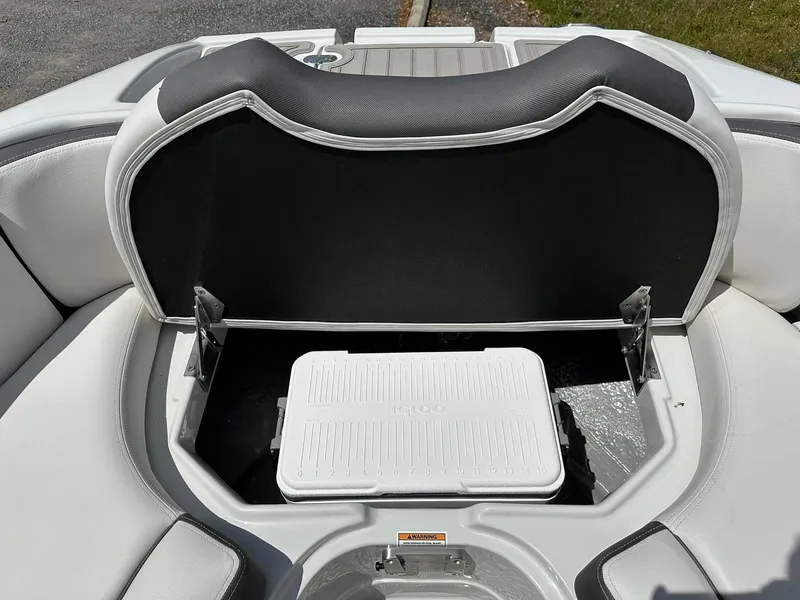 Slide: The Image of 2024 Crownline Eclipse E260 XS boat on trailer in showroom. - 6