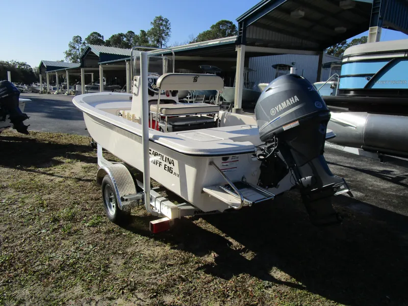Slide: The Image of 2024 Carolina Skiff E Series E16 JVX CC boat with Yamaha motor on trailer. - 10