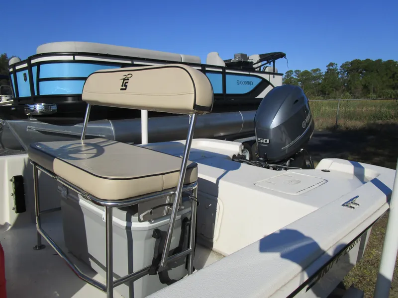 Slide: The Image of 2024 Carolina Skiff E Series E16 JVX CC boat with Yamaha 50 engine. - 6