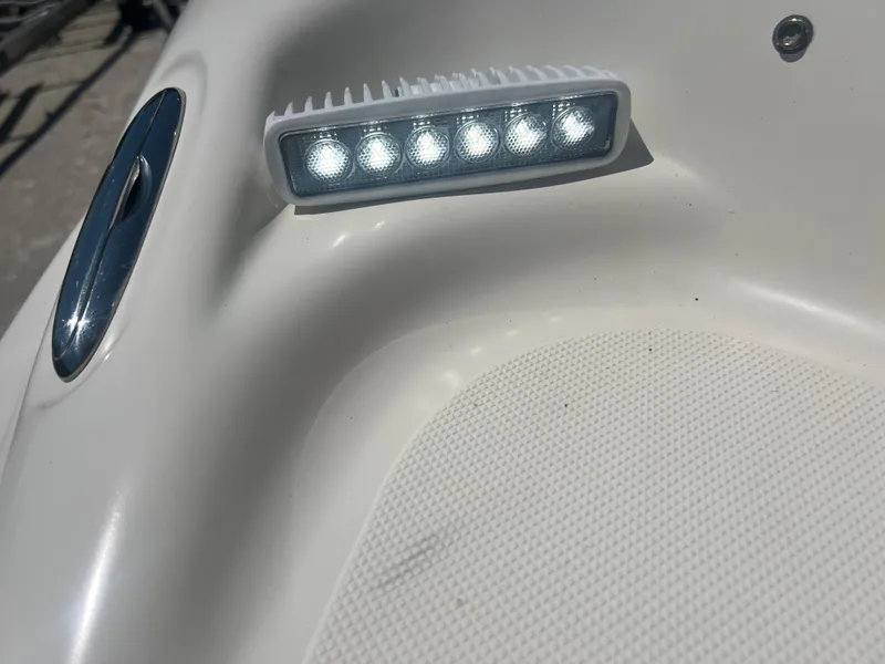 Slide: The Image of LED light on 2007 Hurricane 231 boat deck in sunlight. - 16