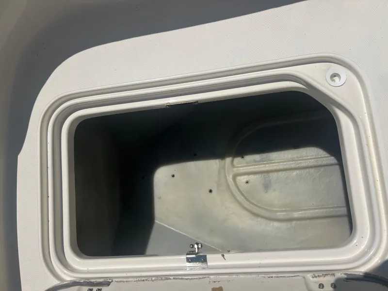 Slide: The Image of Storage compartment of a 2007 Hurricane 231 boat. - 18
