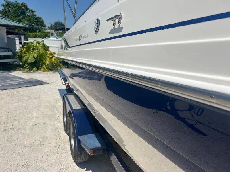 Slide: The Image of 2007 Hurricane 231 boat on a trailer, side view. - 24
