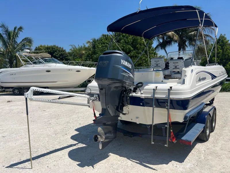 Slide: The Image of 2007 Hurricane 231 boat with Yamaha outboard motor on trailer. - 35