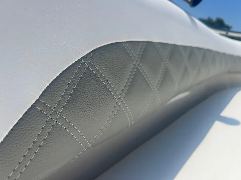 Slide: The Image of Close-up of 2007 Hurricane 231 boat's white and gray diamond-stitched upholstery. - 44