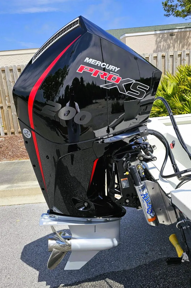 Slide: The Image of 2024 Ranger RB210 boat with Mercury Pro XS 200 outboard motor. - 8