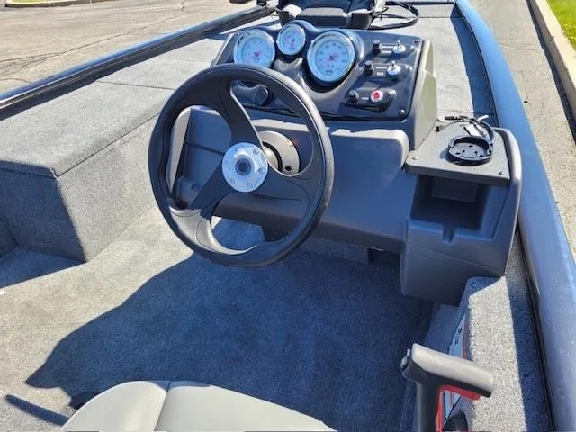 Slide: The Image of 2024 Tracker Pro 170 boat dashboard and steering wheel. - 3