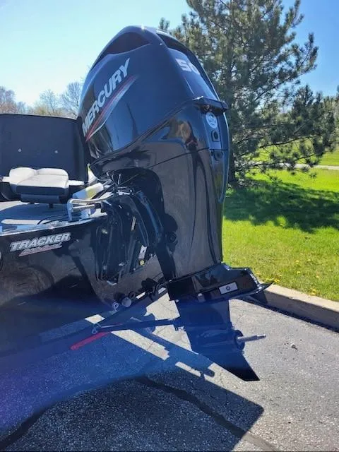 Slide: The Image of 2024 Tracker Pro 170 boat with Mercury outboard motor. - 4