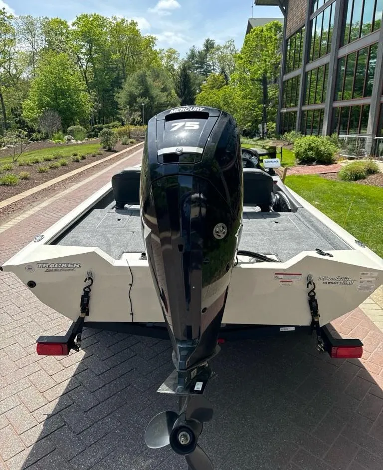 Slide: The Image of 2024 Tracker Pro Team 175 TF boat with a 75 HP Mercury engine. - 3