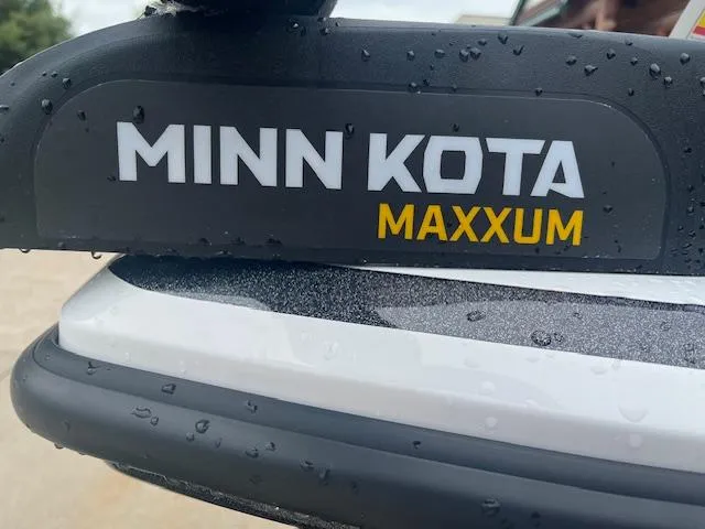 Slide: The Image of Minn Kota Maxxum motor on a 2024 Nitro Z18 boat, close-up view. - 11