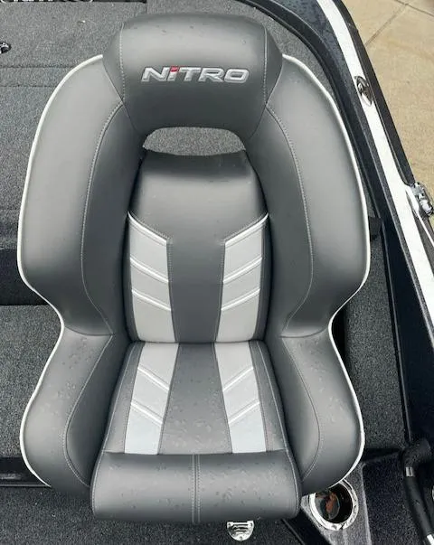 Slide: The Image of 2024 Nitro Z18 boat seat with gray and white design. - 13